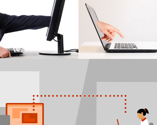 A man sitting at a desk using a computer