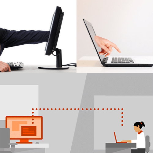 A man sitting at a desk using a computer